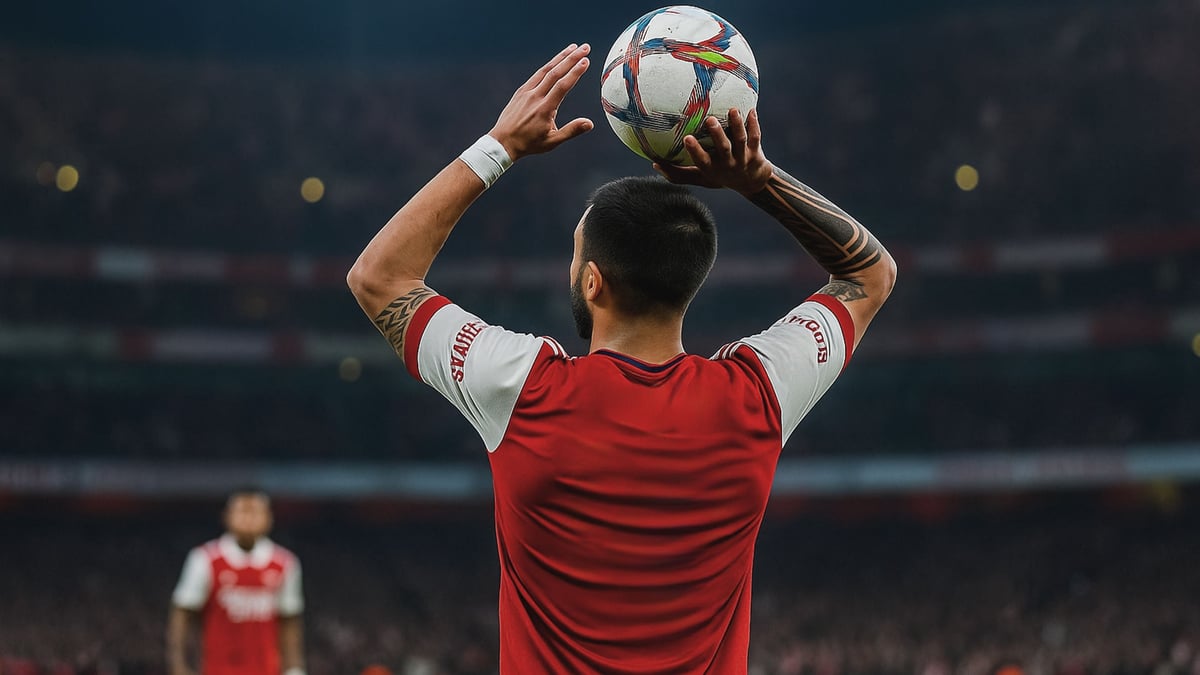 En Arsenalspelare gör ett inkast.