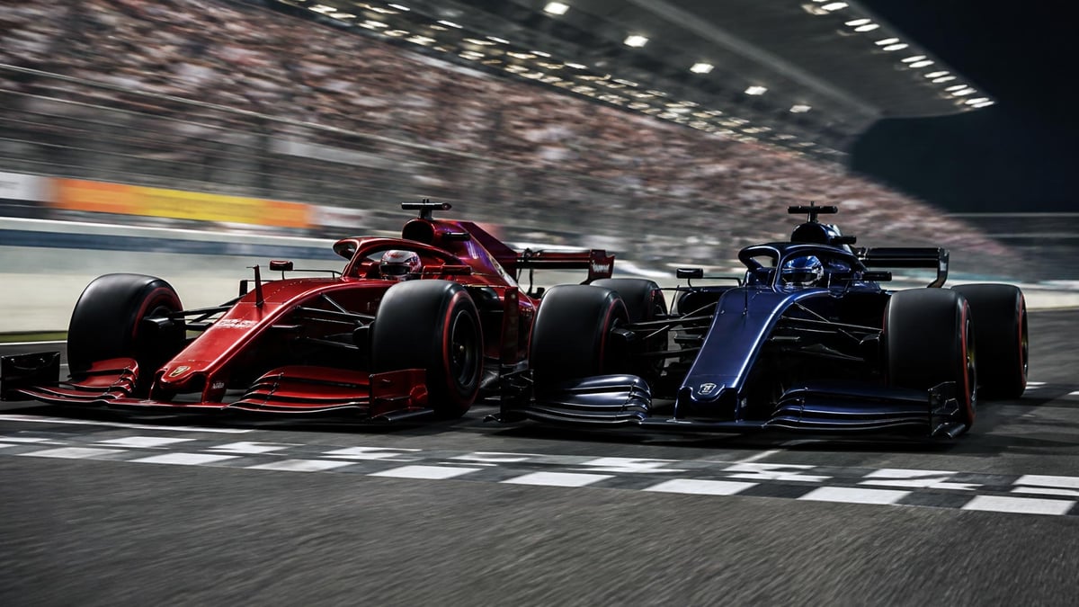 Två F1-bilar i kamp på mållinjen
